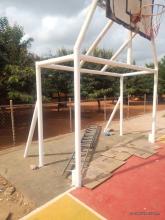 basketball net posts receive a new coat of paint